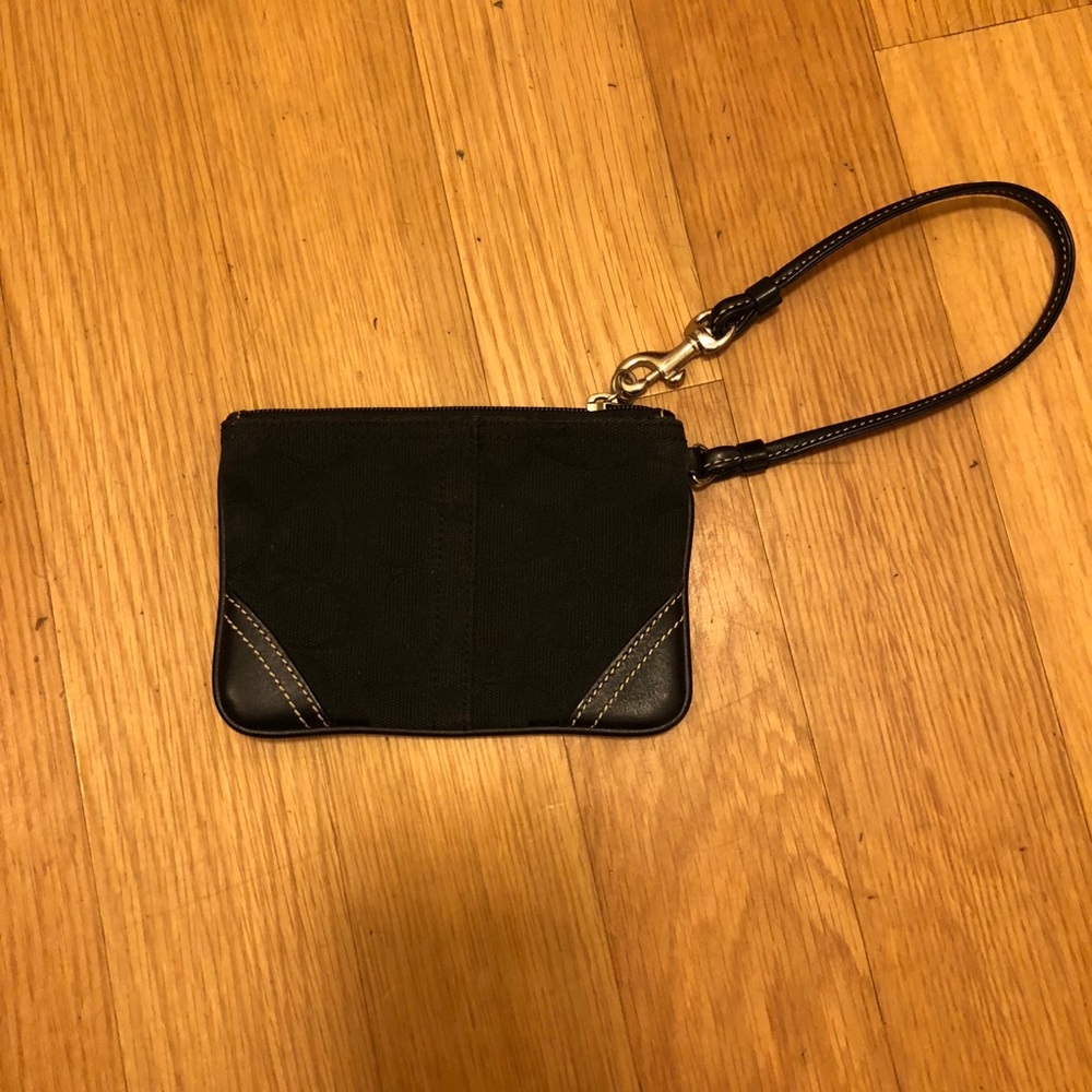 All black Coach wristlet